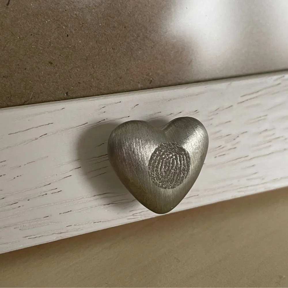 hart met vingerafdruk